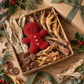 Natural dog treats inside the Festive Paws Christmas box